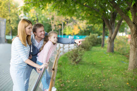 Family with child in zooの写真素材
