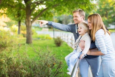 Family with child in zooの写真素材