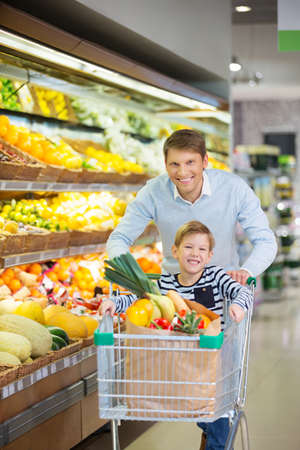 Father and son in a storeの写真素材