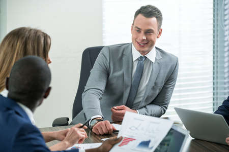 Smiling businessman in office