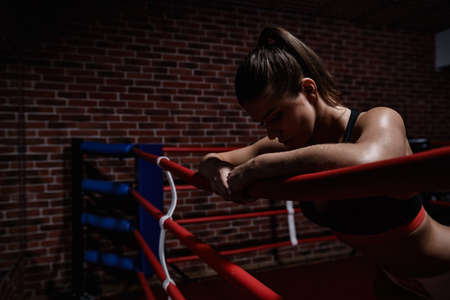 Young woman in boxing ringの写真素材