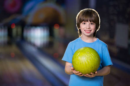 Smiling boy in bowlingの写真素材