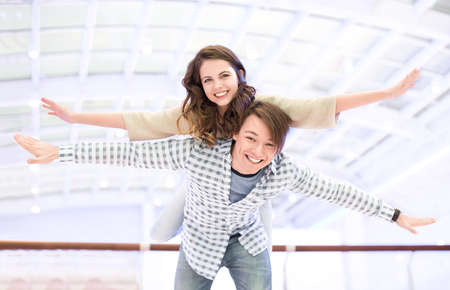 Happy young couple indoorsの写真素材