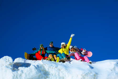 Young people with snowboards