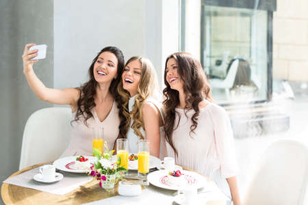 Young women making selfieの写真素材