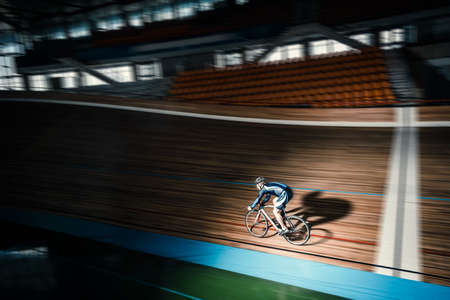 Young cyclist on a velodromeの写真素材