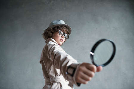 Little detective with a magnifying glassの写真素材