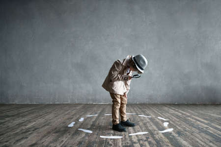 Searching boy in studioの写真素材