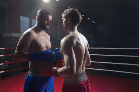 Two men in boxing ringの写真素材