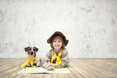 Smiling boy with terrierの写真素材