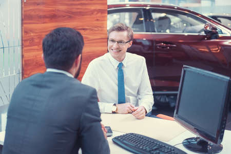 Young business people in officeの写真素材