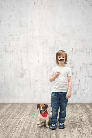 Little boy with dogの写真素材