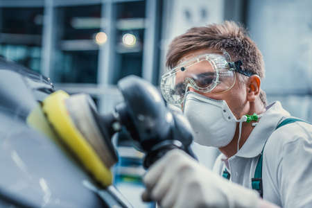 Professional with car in serviceの写真素材