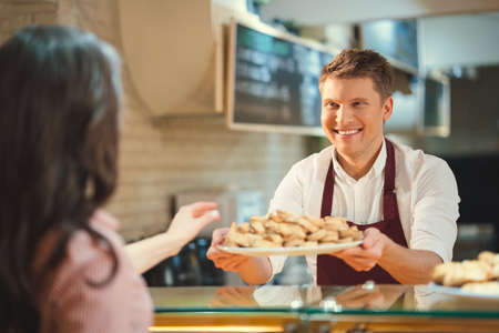 Young woman in bakeryの写真素材