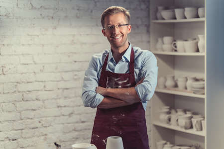 Young man in potteryの写真素材