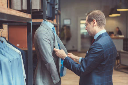 Mature tailor in shopの写真素材
