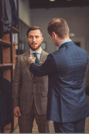 Tailor and customer in atelierの写真素材