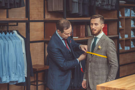 Young businessman in atelierの写真素材