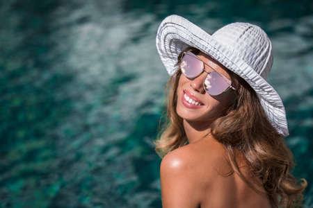 Young woman in sunglassesの写真素材