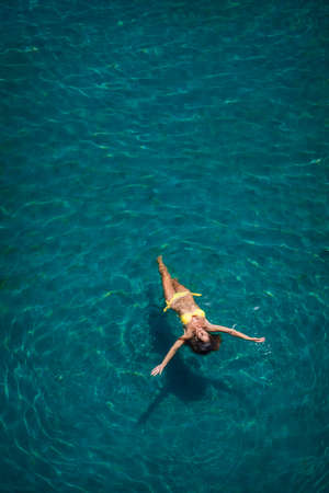 Attractive girl in the poolの写真素材