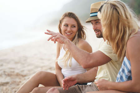 Young friends on the beach