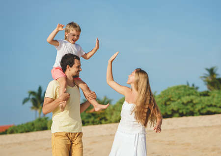 Smiling people on the beachの写真素材