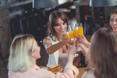 Smiling women in a cafeの写真素材