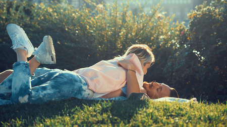 Happy young couple in the parkの写真素材