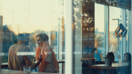 Young attractive couple in a cafe