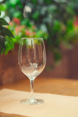 A glass of wine in a cafeの写真素材