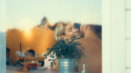 Young couple in love in a cafeの写真素材