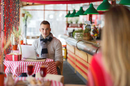Young couple on a romantic date in a restaurantの写真素材