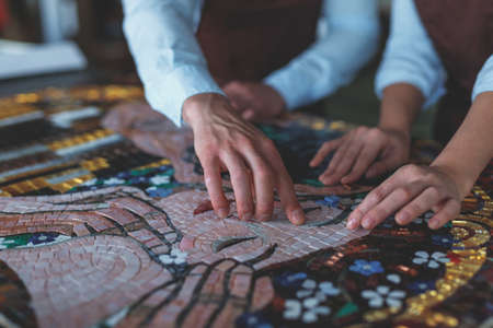 Human hands at artworkの写真素材