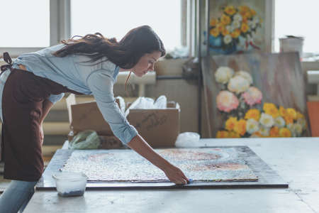 Young woman with a mosaicの写真素材