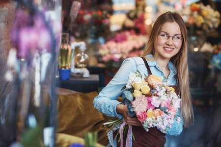 Young woman with flowersの写真素材