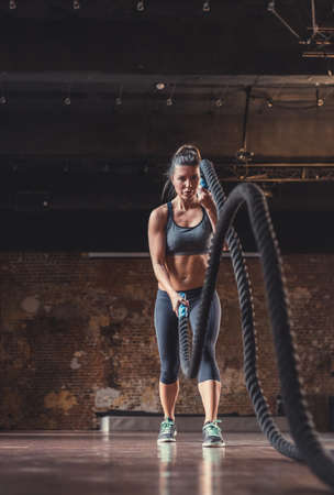 Young sporty woman at workout