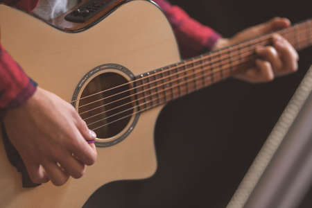 Young man playing the guitar