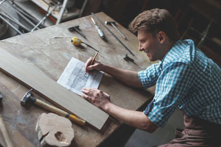 Young man in the carpentryの写真素材