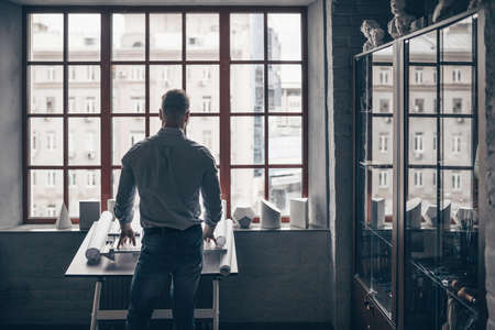 Mature man by the window