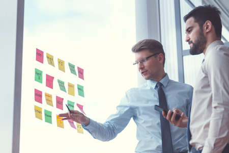 Young businessmen in office