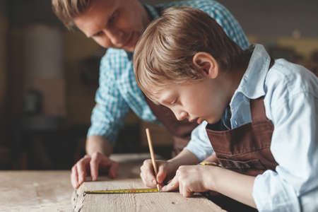 Father and son at work