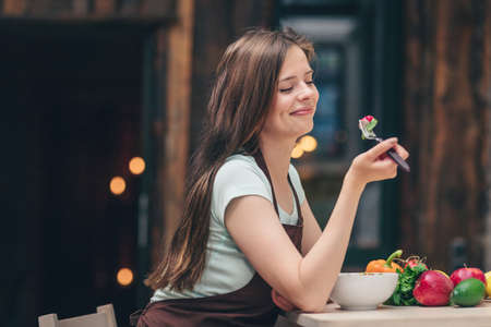 Attractive woman in the kitchenの写真素材