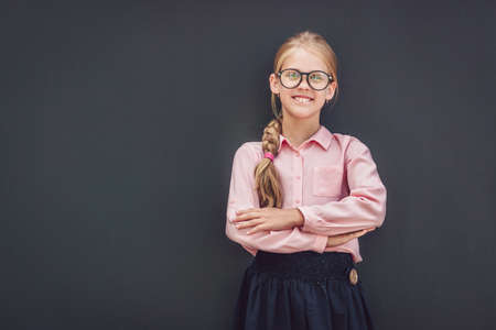 Little schoolgirl in uniformの写真素材