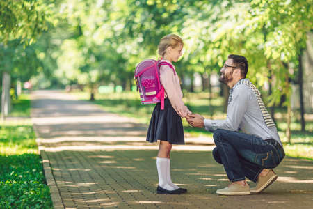 Smiling family in the parkの写真素材