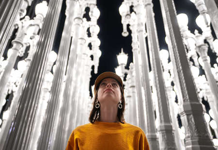 Young woman at the lanterns in Los Angeles, USA