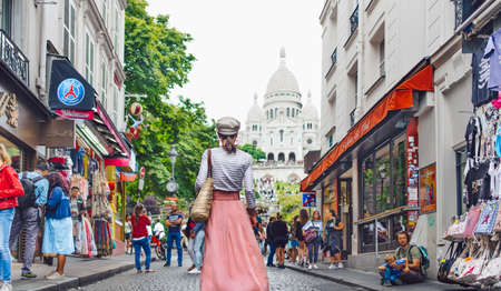Young woman on a street in Paris, Franceのeditorial素材