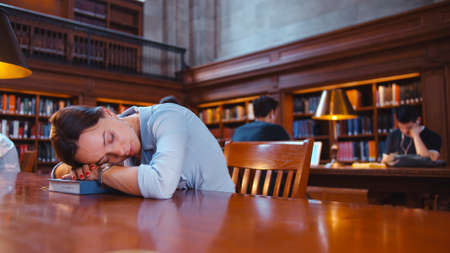 Sleeping woman at the library in New Yorkの写真素材