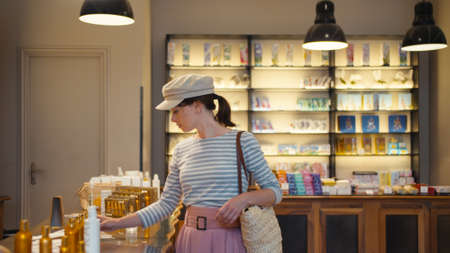 Young girl in a beauty store in Paris, Franceの写真素材