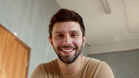 Portrait of a smiling man looking at cameraの写真素材