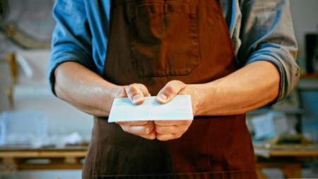 Young professional in uniform at work close-upの写真素材